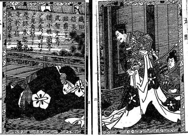 信長に叱責される光秀（『絵本太閤記』より。出典：国立国会図書館デジタルコレクション）