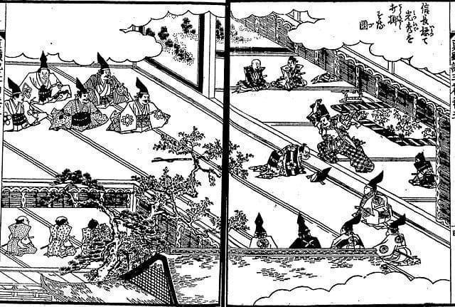 武田征伐の後、諏訪で信長が光秀を殴るシーン(『絵本太閤記』より。出典:国立国会図書館デジタルコレクション)